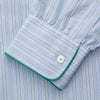 View 3 of product The Turnbull & Asser Blue and Green Stripe Poplin Cotton Nightshirt features long sleeves, a rounded hem, front pocket, green-trimmed collar and pocket, and front buttons—ideal men's nightwear for any season.