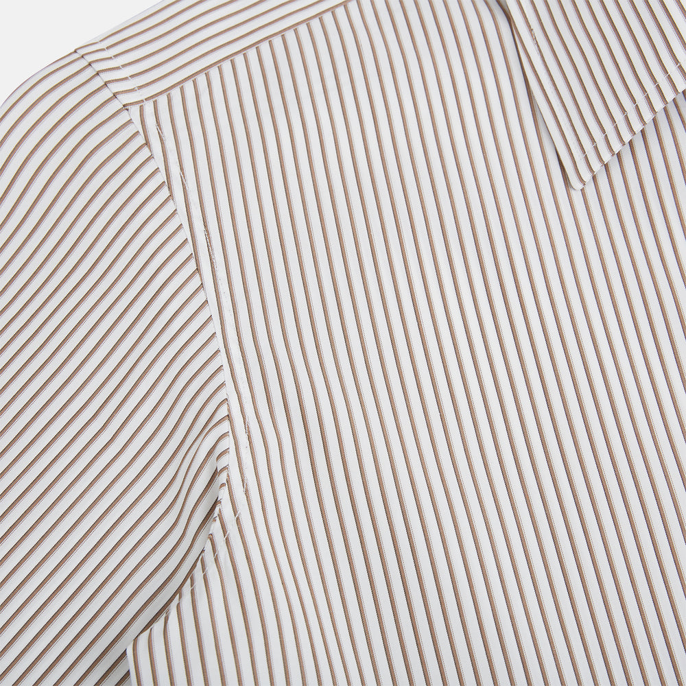 The Turnbull & Asser Coffee Multi Stripe Westminster Shirt features long sleeves, a button-up front, subtle beige and white stripes, a pointed Turnbull collar, and buttoned cuffs—expertly crafted in Britain and shown flat on a white background.