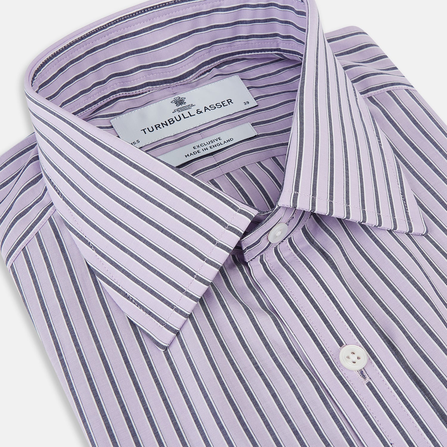 View 2 of product The Turnbull & Asser Lilac Ticking Stripe Mayfair Shirt in Italian cotton features long sleeves, a classic collar and cuffs, and is shown on a white background.