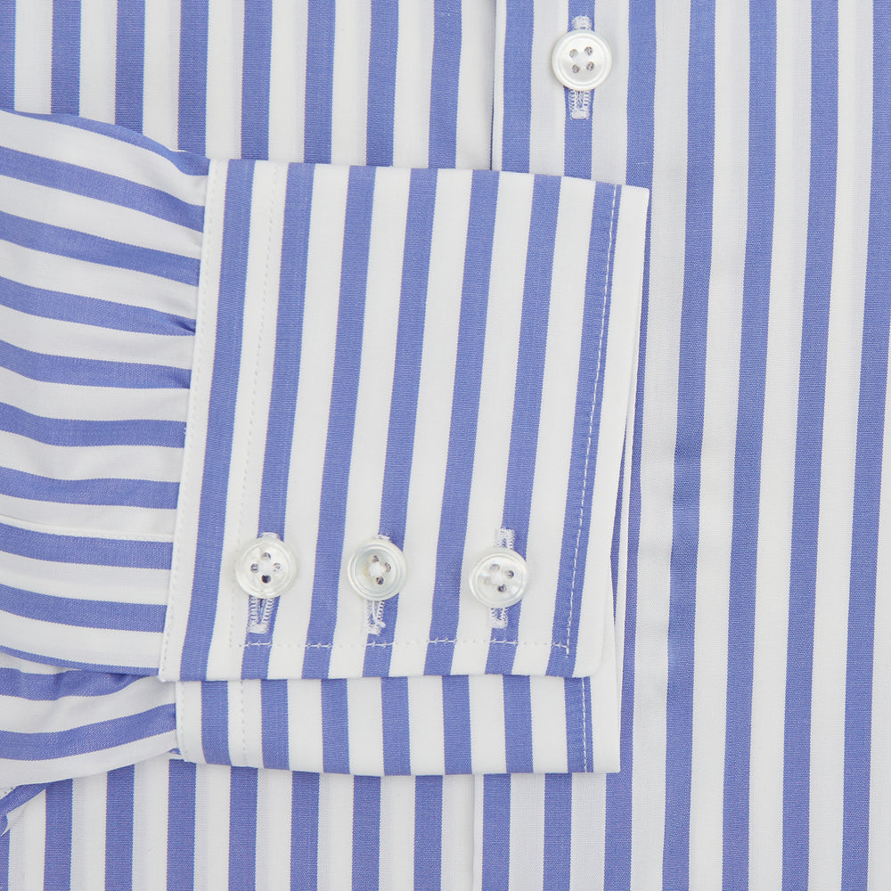 The Turnbull & Asser Tailored Fit Blue and White Candy Stripe Shirt, featuring a Kent collar and 3-button cuffs, is displayed neatly on a white background.