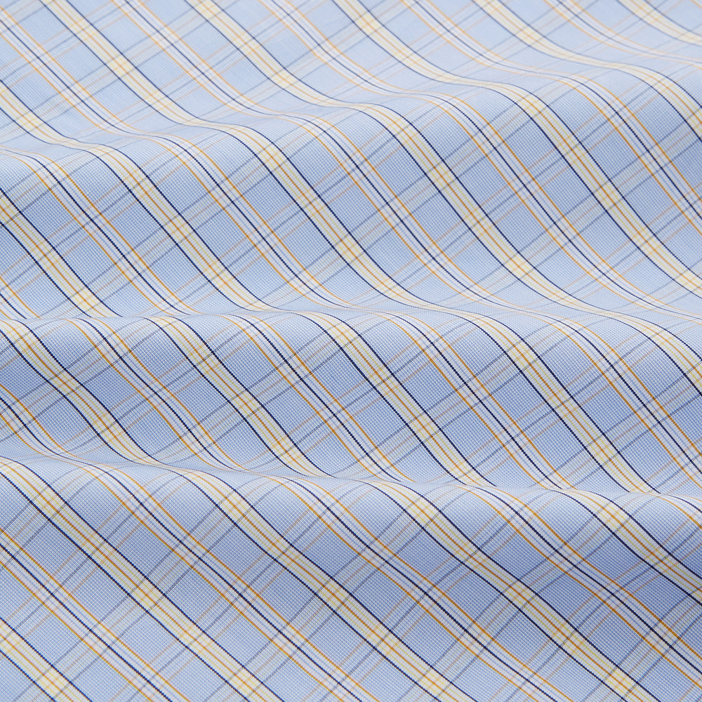 The Turnbull & Asser Blue and Yellow Check Poplin Cotton Dressing Gown features long sleeves, a shawl collar, front pockets, and a matching belt at the waist, shown on a plain white background.