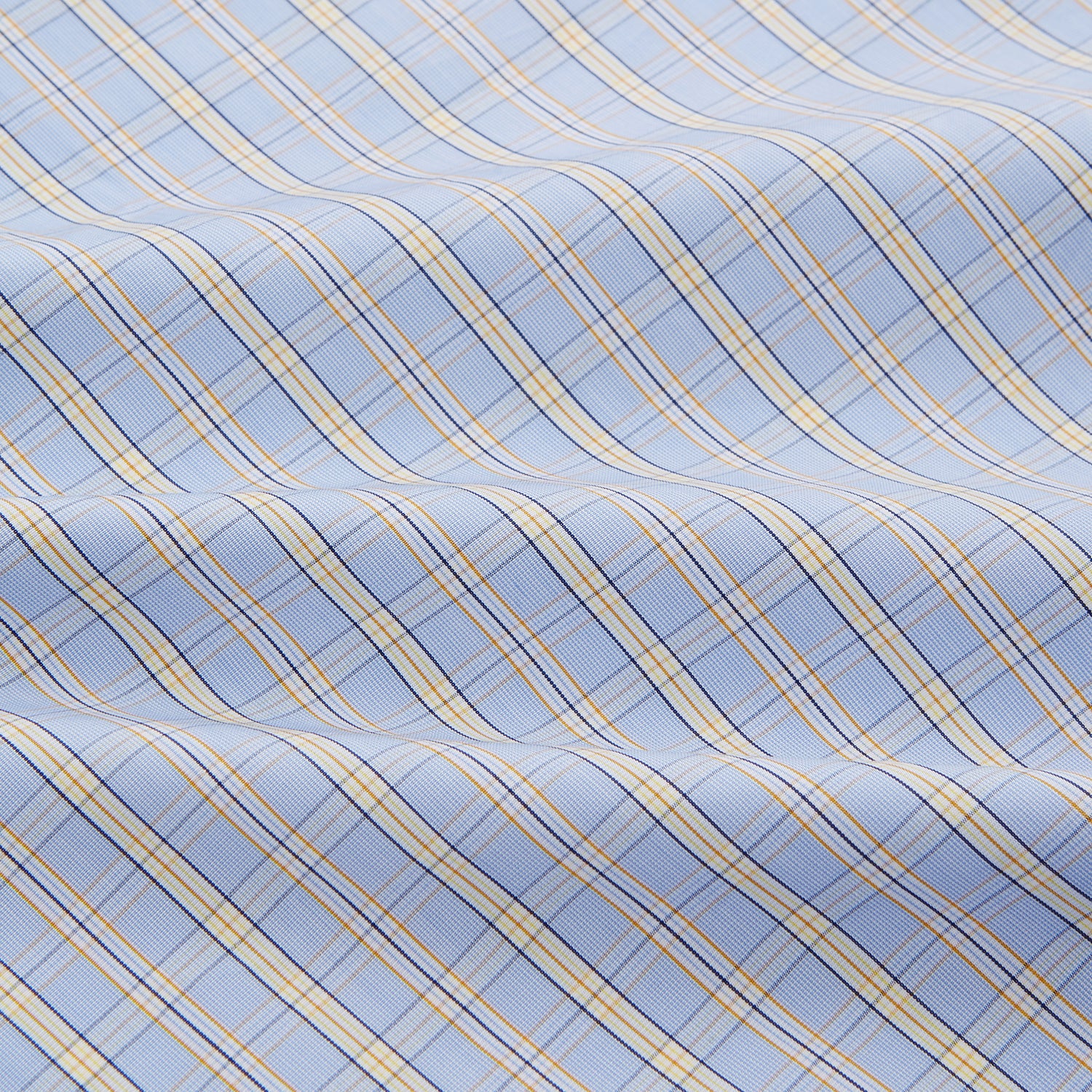 View 4 of product The Turnbull & Asser Blue and Yellow Check Poplin Cotton Dressing Gown features long sleeves, a shawl collar, front pockets, and a matching belt at the waist, shown on a plain white background.