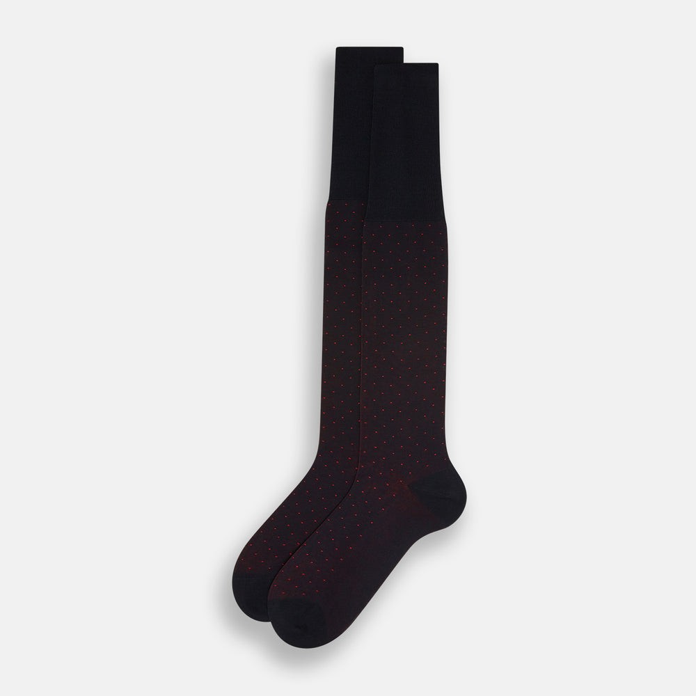 A single Turnbull & Asser Navy/Red Polka Dot Long Sock, crafted from mercerised Egyptian cotton, is displayed against a plain white background.