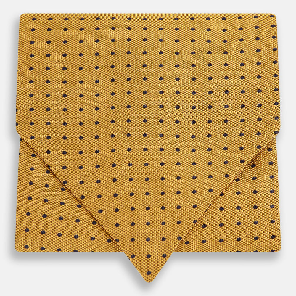 A refined formal accessory, the Turnbull & Asser Navy and Yellow Micro Dot Silk Cravat features a textured silk fabric with small yellow micro dots—perfectly complementing your pocket square for an elegant look.