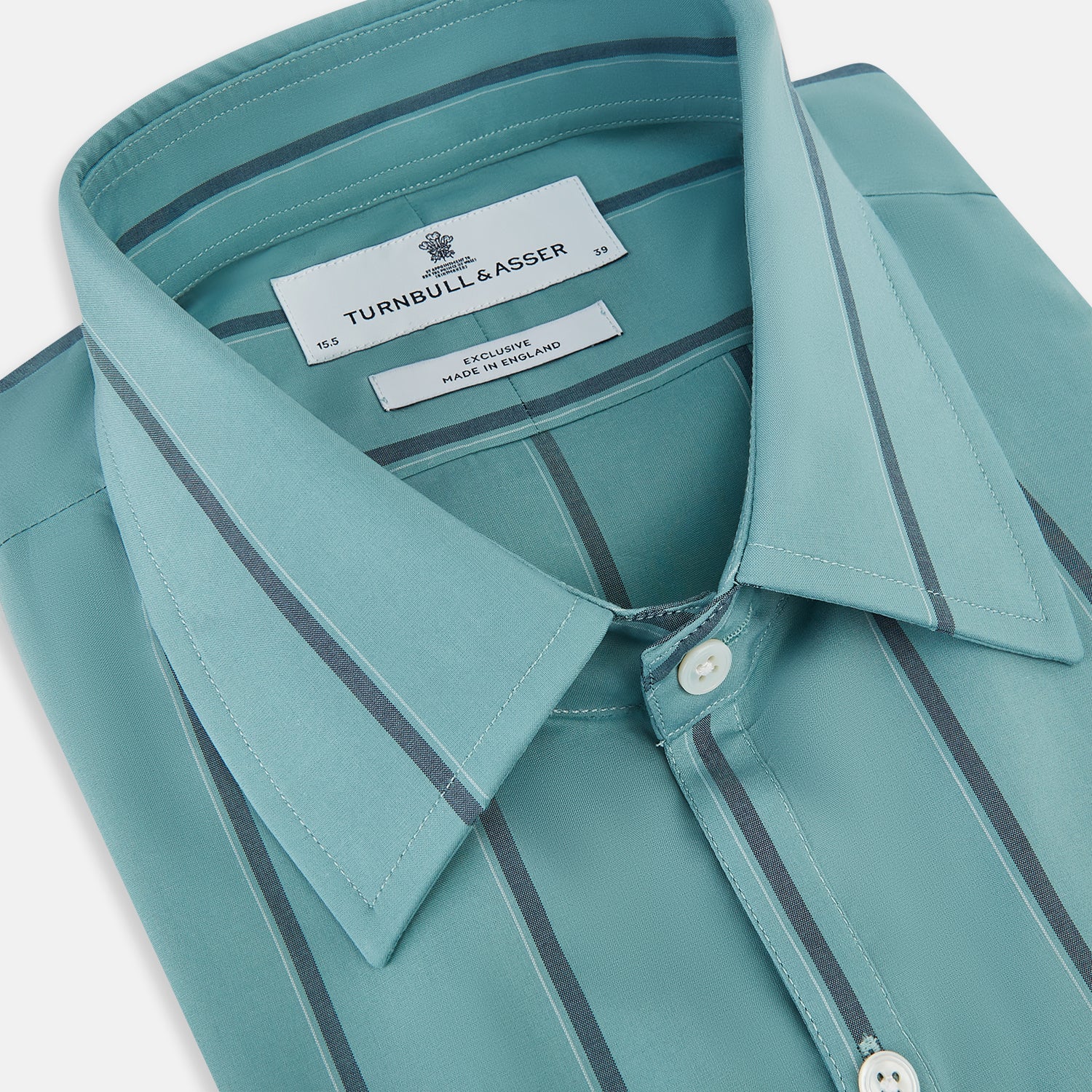 View 2 of product The Turnbull & Asser Sage Track Stripe Westminster Shirt features long sleeves, a tailored fit, a collar, and vertical dark blue stripes, with button closures down the front and at the cuffs, shown laid flat on a white background.
