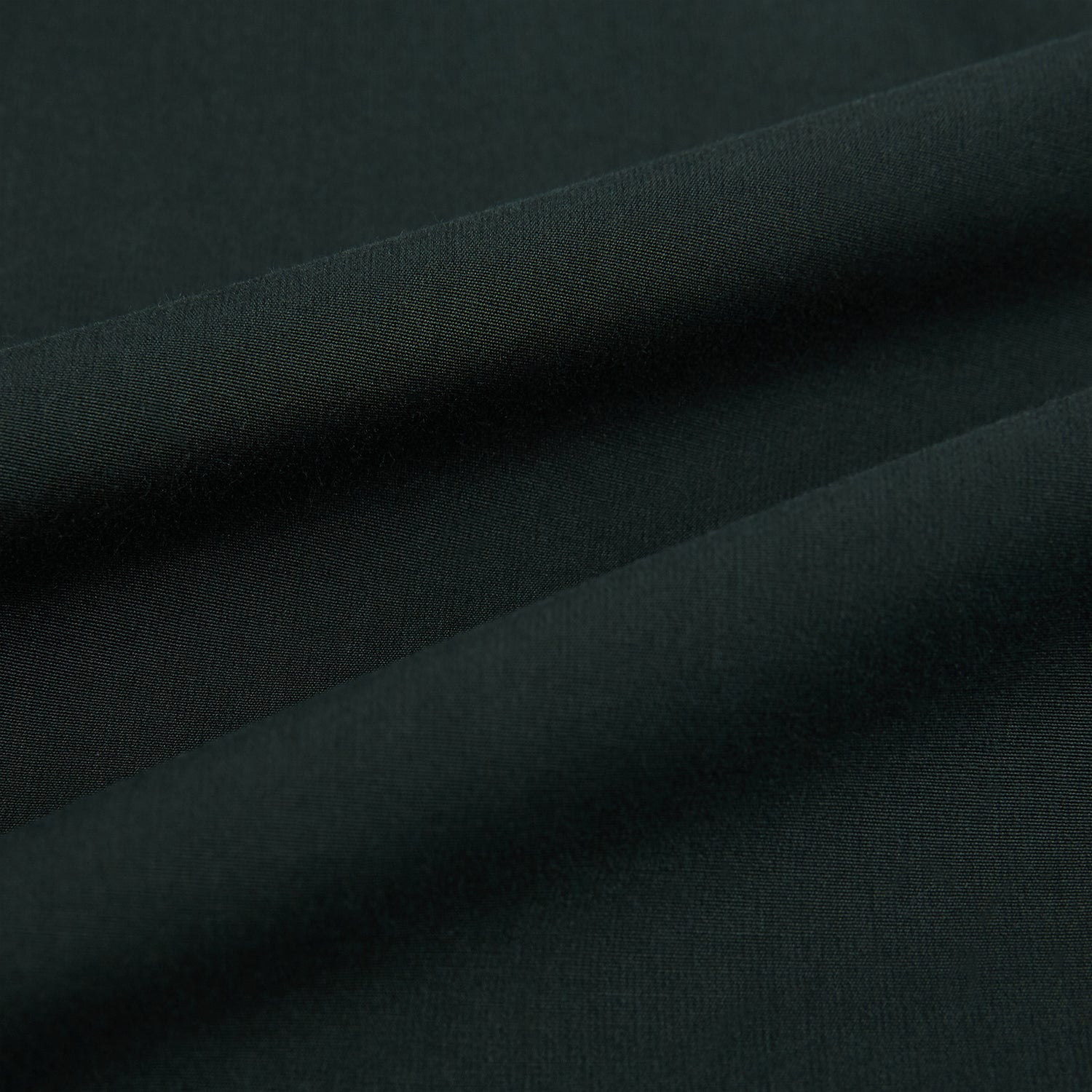 View 8 of product The FOREST GREEN WINDSOR SHIRT by Turnbull & Asser features long sleeves, a Windsor collar, and buttoned cuffs, reflecting British craftsmanship. Displayed on a plain white background.