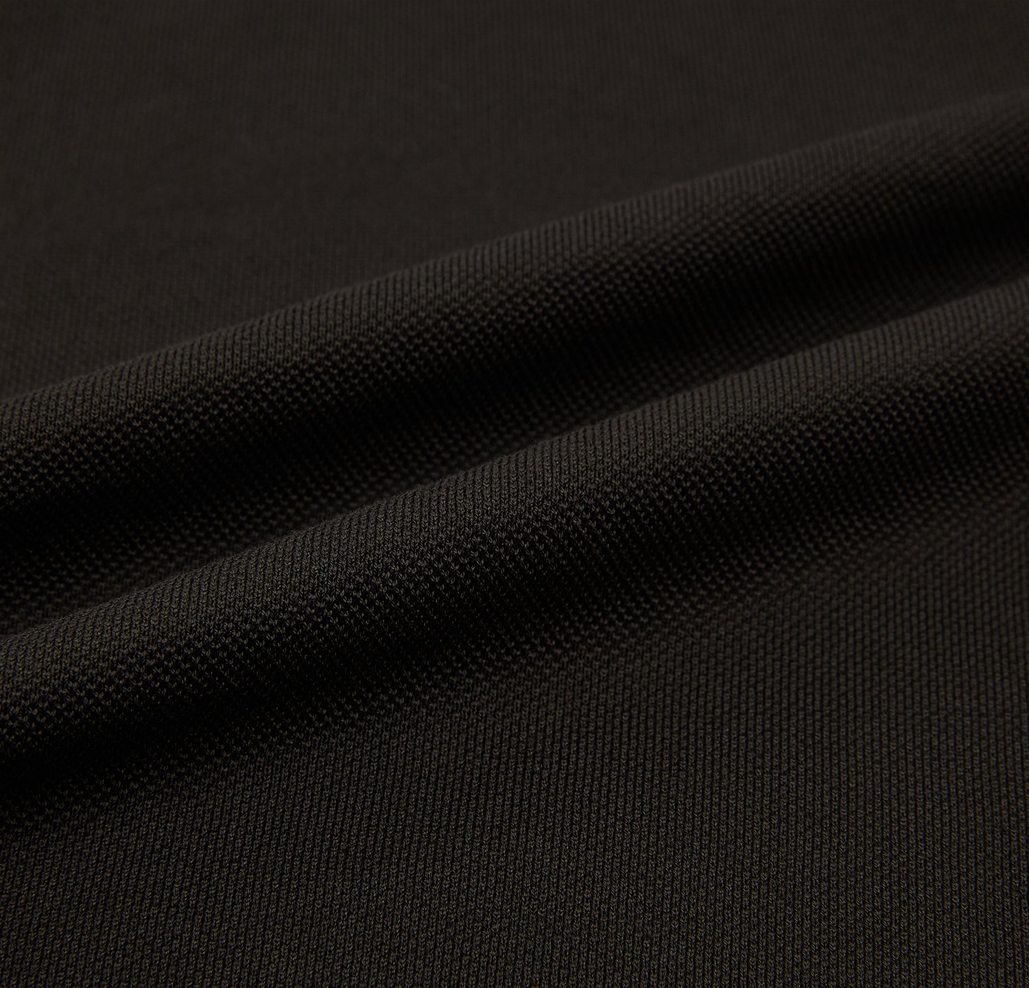 View 5 of product A brown cotton jersey polo shirt by Turnbull & Asser with short sleeves, a collar, three buttons, and a buttoned chest pocket, laid flat on a white background.