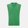 View 1 of product The Fern Green Cashmere V-Neck Vest by Turnbull & Asser is a men's sleeveless jumper, ideal for layering, shown against a plain white background.