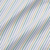View 6 of product A man wears the Turnbull & Asser Yellow Multi Blazer Stripe Weekend Fit Suffolk Shirt, standing against a beige background with his hands relaxed—a casual look perfect for weekends.