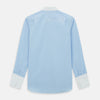 View 3 of product The Turnbull & Asser Light Blue End-on-End Shirt features a crisp white T&A contrast collar and double cuffs, shown flat on a white background.