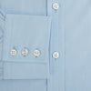 View 4 of product The Turnbull & Asser Sky Blue Mayfair Shirt is a long-sleeved, collared button-down made from sanforised cotton, shown laid flat on a white background.