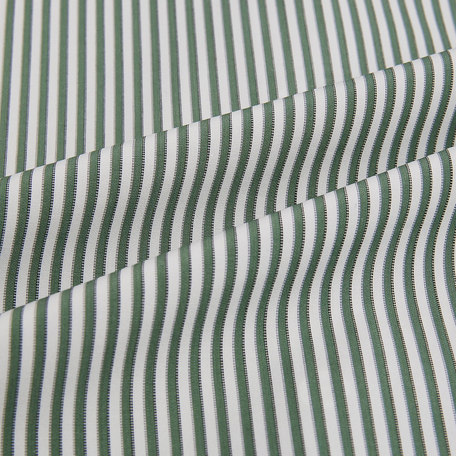 View 8 of product The Melon Green Halo Stripe Westminster Shirt by Turnbull & Asser, featuring thin green and white stripes and a classic Turnbull collar, is displayed against a plain white background—a testament to refined British craftsmanship.
