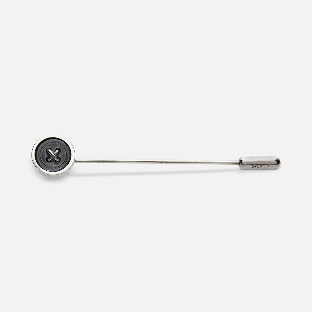 The Turnbull & Asser Sterling Silver Tie Pin features a black button design on one end and a metallic cap engraved with "SILVER" on the other, displayed against a plain white background.