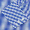 View 3 of product The Turnbull & Asser Mid-Blue Gingham Check Shirt features a T&A collar and 3-button cuffs, crafted from cotton and displayed folded on a plain white background.