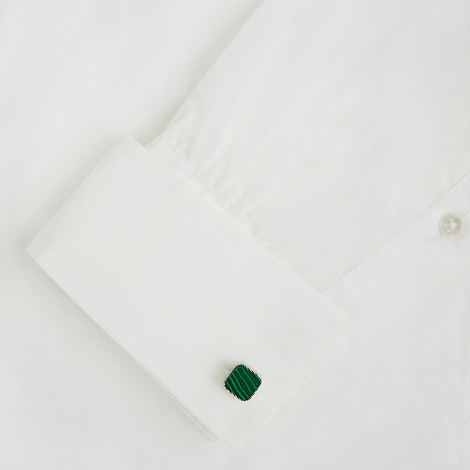 View 3 of product Turnbull & Asser Malachite Square Cufflinks feature green, wavy-striped stone inlays set in sterling silver and are shown against a white background.