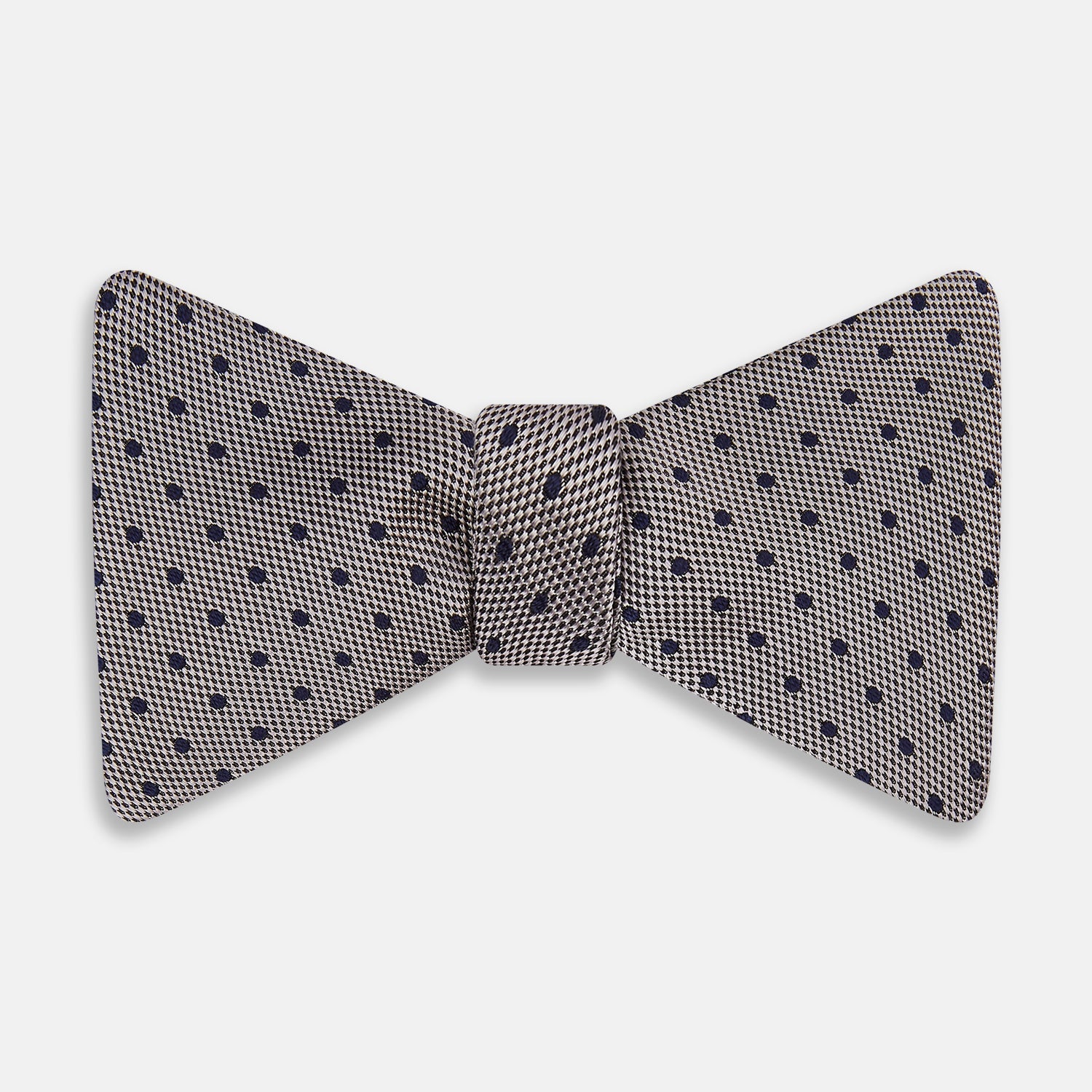 View 1 of product The Turnbull & Asser Navy and Silver Micro Dot Silk Bow Tie, featuring a refined dot pattern, is displayed on a white background.