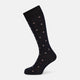 The Turnbull & Asser Midnight Patterned Mid-Length Sock features a ribbed cuff and a design of small white hexagons with red dots, shown here as a single sock on a plain white background.