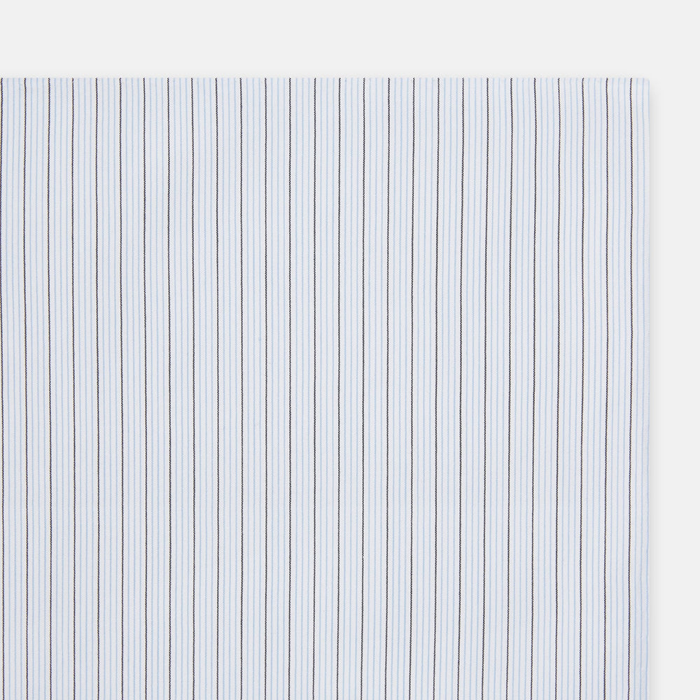 The Turnbull & Asser Hand Rolled Blue Multi Stripe Handkerchief features light blue cotton with thin black and white stripes, making it a refined accessory for the gentleman.