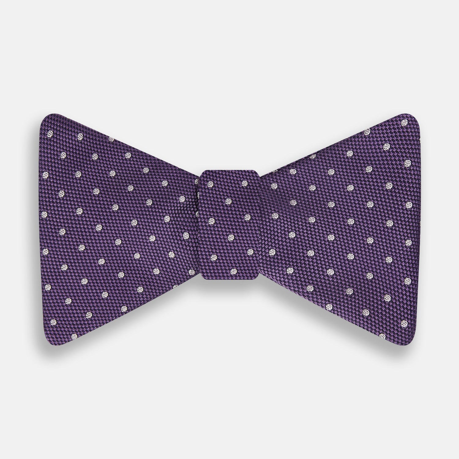 View 1 of product The Turnbull & Asser Lilac and Royal Purple Micro Dot Silk Bow Tie is shown against a plain white background.