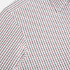 View 6 of product The Turnbull & Asser Red and Midnight Blue Tattersall Check Windsor Shirt features British craftsmanship, shown laid flat with sleeves extended and collar neatly folded.