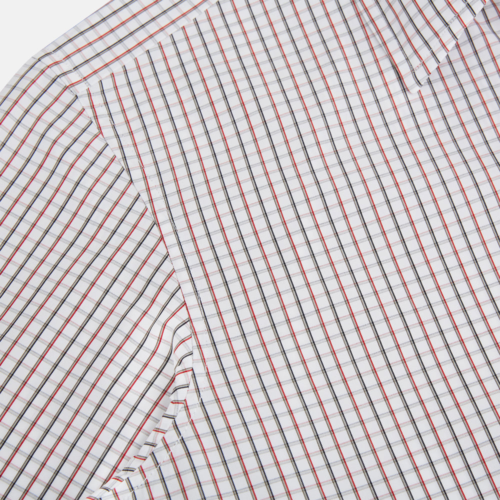 The Turnbull & Asser Red and Midnight Blue Tattersall Check Windsor Shirt features British craftsmanship, shown laid flat with sleeves extended and collar neatly folded.