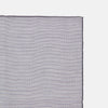 View 3 of product The Lilac Cotton-Blend Handkerchief by Turnbull & Asser is neatly folded with a corner flipped over, exposing the hand-rolled edges, and displayed against a white background.