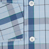View 4 of product The Turnbull & Asser Blue Multi Check Pyjama Shirt features a blue and white check pattern, long sleeves, and a collar—an elegant loungewear option perfect for nightwear.