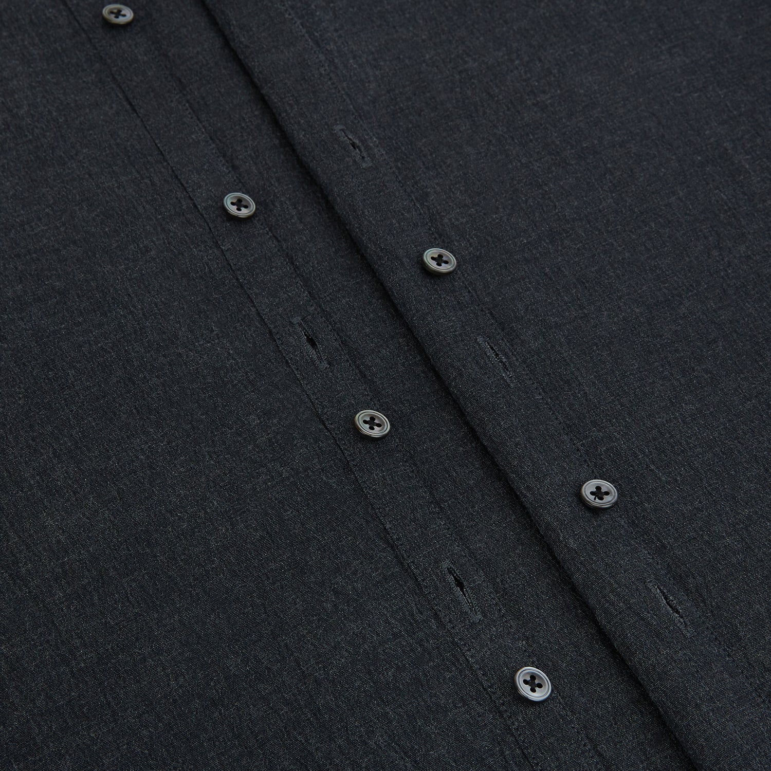 View 7 of product The Turnbull & Asser Midnight Blue Westminster Shirt features long sleeves, a button-up front, classic collar, and buttoned cuffs in a plain design—showcasing British craftsmanship—laid flat on a white background.