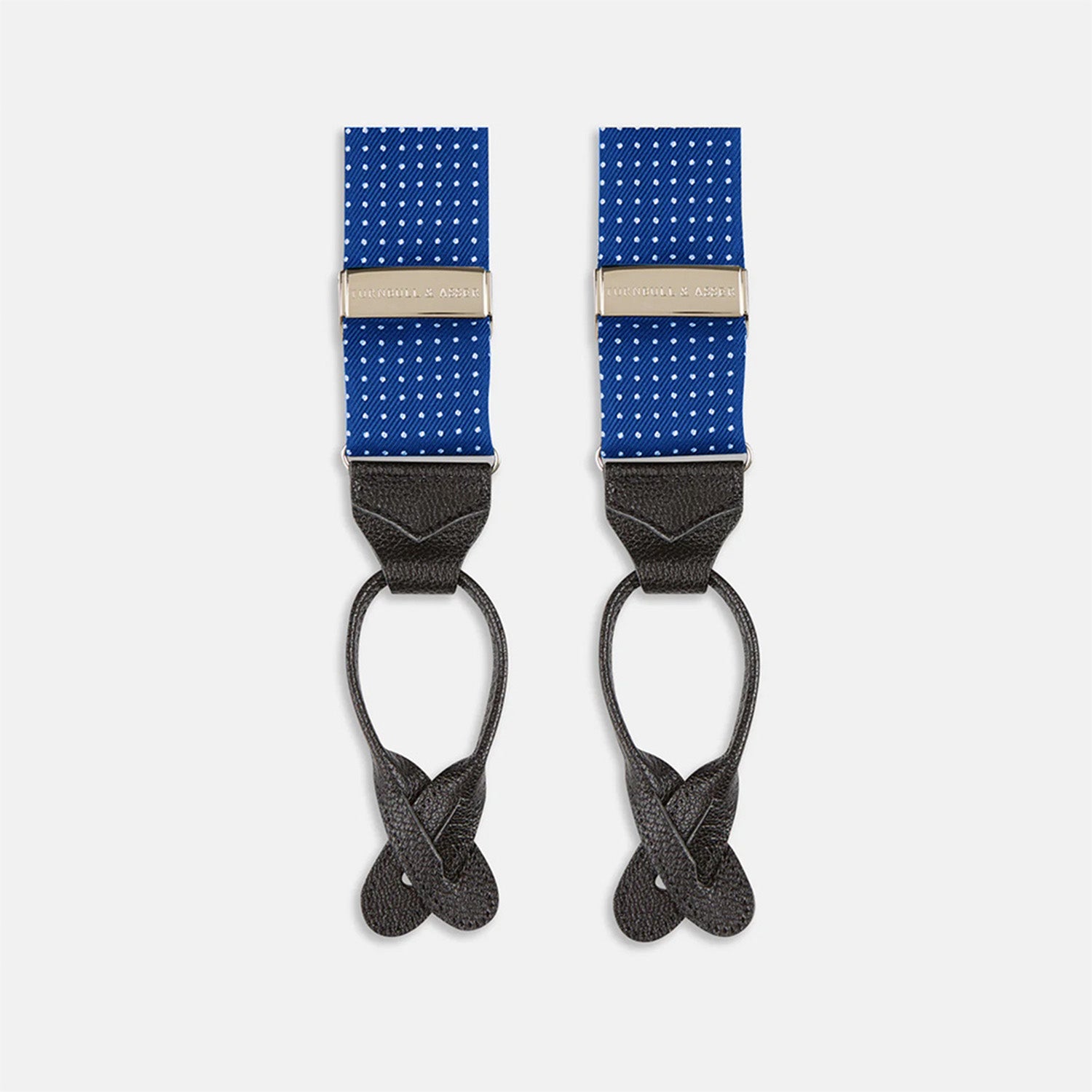 View 1 of product Turnbull & Asser Royal Blue Small Spot Adjustable Silk Braces, detailed with black leather ends and silver clips, are perfect for refined style. Shown laid flat on a plain white background.