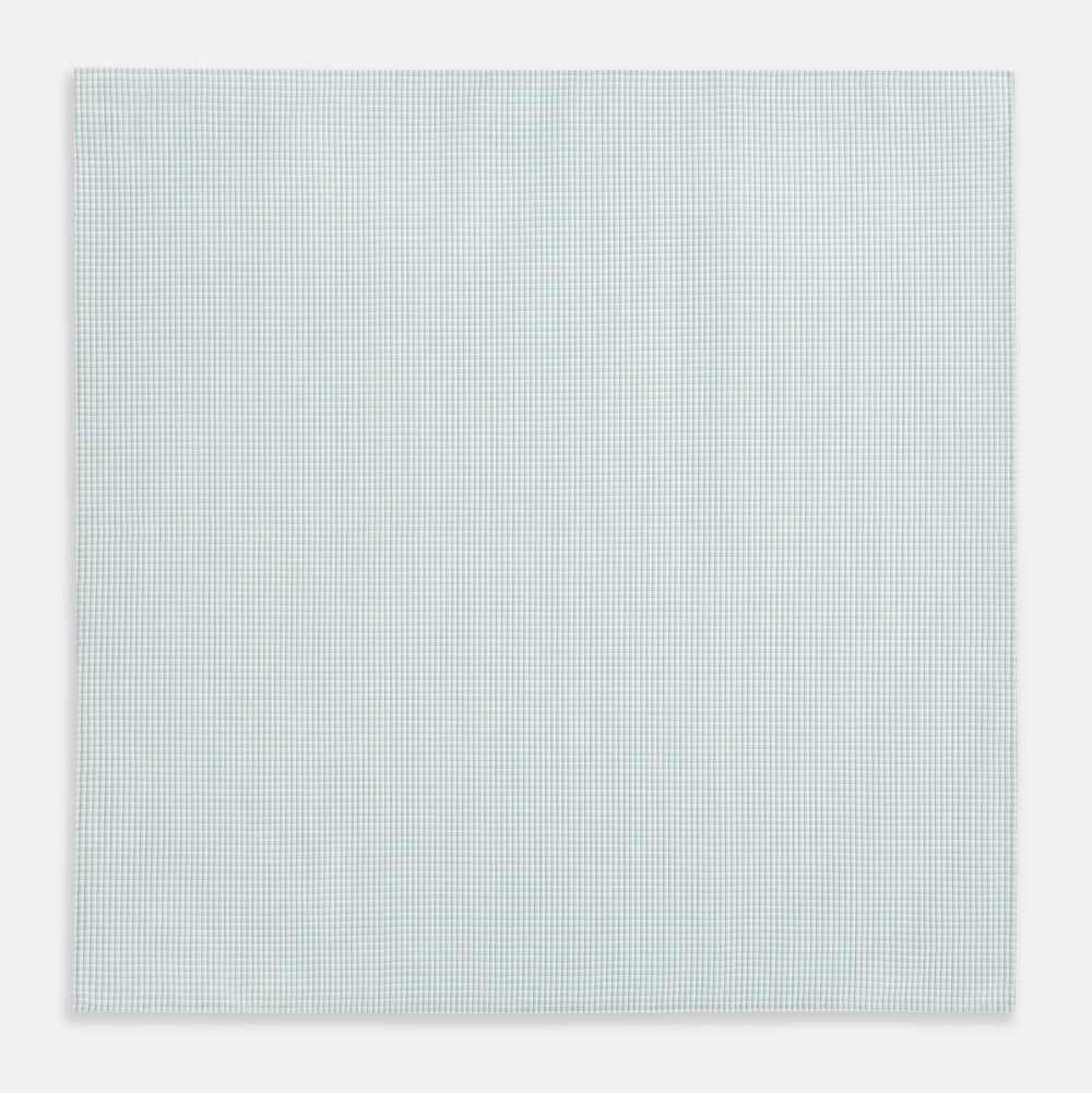 The Turnbull & Asser Sage Green Shadow Grid Check Hand-Rolled Handkerchief features a grid of small squares and hand-rolled edges, shown neatly folded on a white background.