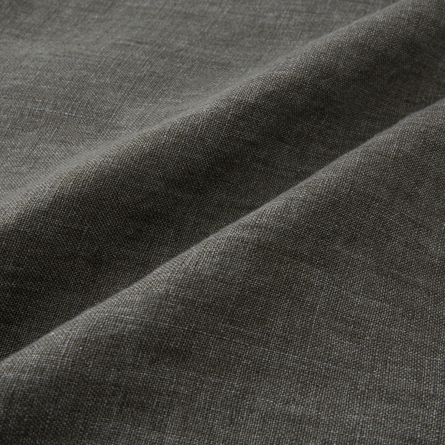 View 5 of product The Olive Linen Holland Shacket by Turnbull & Asser is a lightweight olive button-up jacket in Irish linen with a collar, two front pockets, one chest pocket, and slanted hem pockets—ideal outerwear shown on a plain white background.