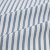 View 6 of product The Turnbull & Asser Blue Multi Wide Track Stripe Mayfair Shirt is a long-sleeve, button-up shirt with a classic collar and vertical blue and white stripes, shown on a white background.