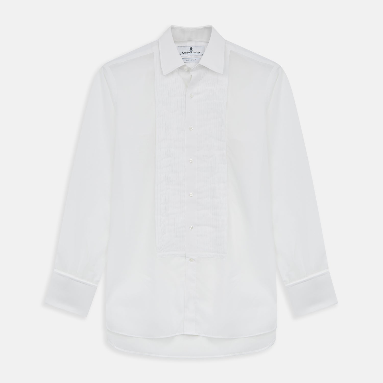 View 1 of product The Die Another Day Inspired Voile Dress Shirt by Turnbull & Asser features a white pleated front, button-down closure, and classic collar—laid flat on white to showcase its timeless James Bond style.