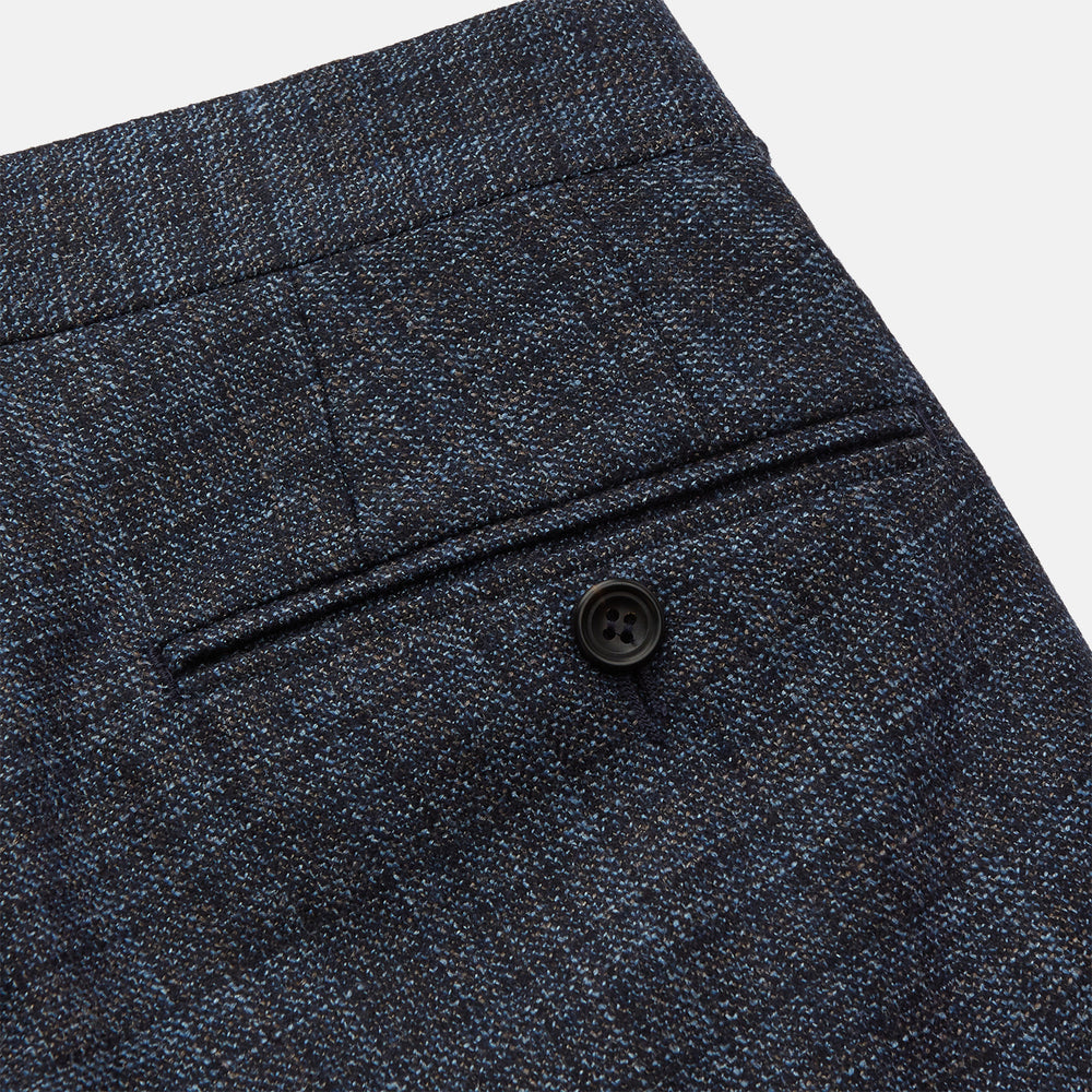 The Turnbull & Asser Navy Check Wool and Cashmere Blend Wilson Trousers feature a subtle plaid, belt loops, front pleats, and a straight-leg fit, displayed against a light background.