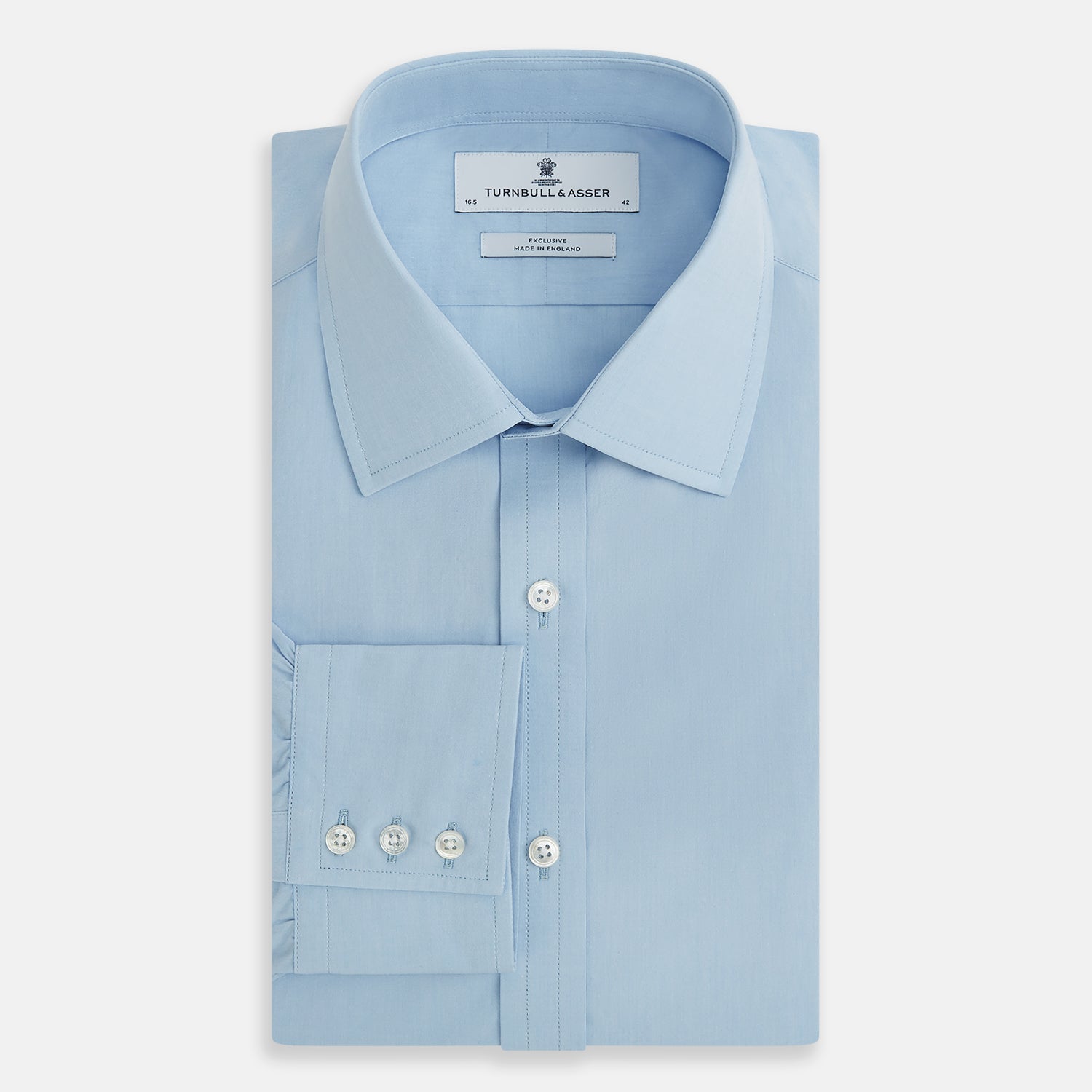 View 5 of product The Turnbull & Asser Sky Blue Mayfair Shirt is a long-sleeved, collared button-down made from sanforised cotton, shown laid flat on a white background.