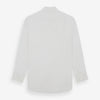 View 5 of product The Turnbull & Asser White Poplin Shirt features a regent collar, button-down front, and 2-button cocktail cuffs, shown against a plain white background.