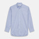 The Turnbull & Asser Mid-Blue Chambray Weekend Fit Shirt features a Dorset collar, white buttons, and 1-button cuffs. It is laid flat on a white background.