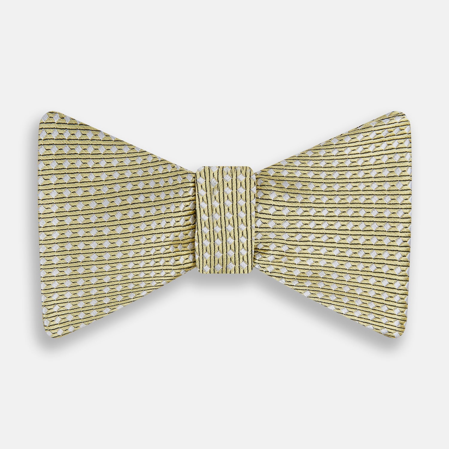 View 1 of product The Turnbull & Asser Gold and White Square Silk Bow Tie features a textured design with square patterns, ideal for formalwear, and is elegantly presented on a white background.