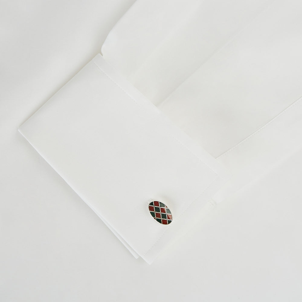 Turnbull & Asser’s Forest Green and Burgundy Checkered Oval Enamel Chain Cufflinks showcase masculine elegance with their sophisticated pattern and refined silver finish.