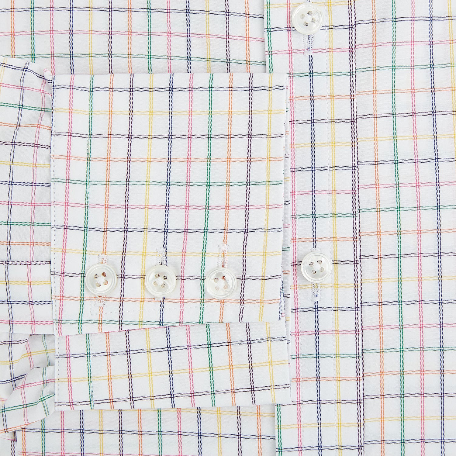 View 4 of product The Rainbow Double Grid Check Mayfair Shirt by Turnbull & Asser features a white base with thin blue, red, and green checks and a T&A collar. It’s displayed neatly laid flat on a white background.