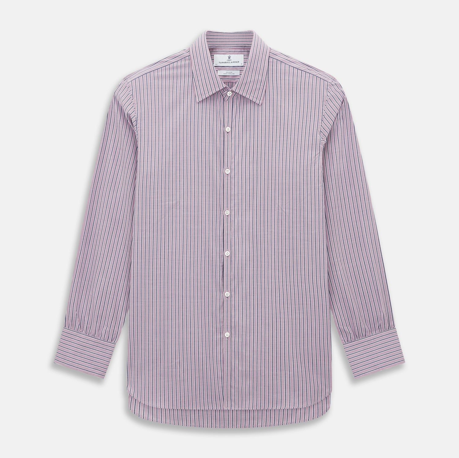 View 1 of product The Turnbull & Asser Antique Pink Ticking Stripe Westminster Shirt is a collared, long-sleeve button-up with thin vertical pink stripes on white, highlighting British craftsmanship. It’s shown neatly laid flat and fully buttoned.