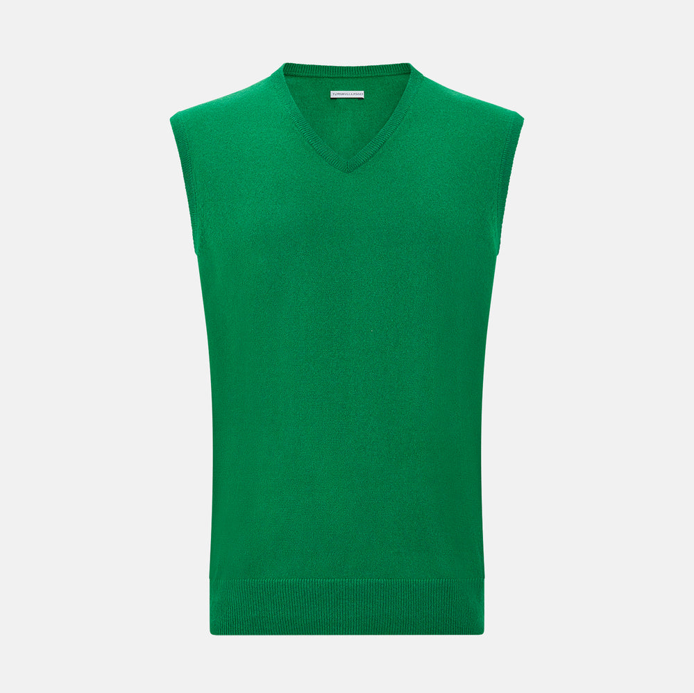 The Turnbull & Asser Grass Green Cashmere V-Neck Vest is shown against a plain white background, offering a refined choice for a distinguished ensemble.