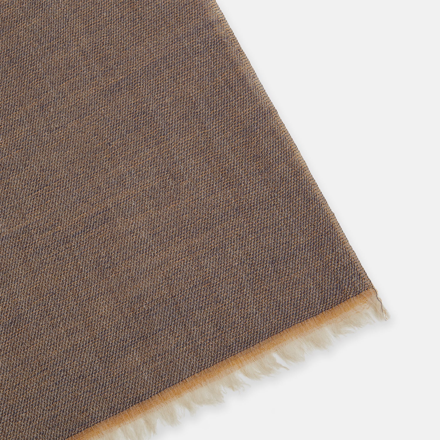 View 2 of product The Turnbull & Asser Camel and Grey Melange Cashmere Scarf features ultra-soft cashmere in a subtle plaid, looped with short fringe edges, shown against a plain white background.