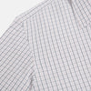 View 6 of product The Blue and Red Graph Check Westminster Shirt by Turnbull & Asser features a classic collar, long sleeves, and British craftsmanship, with a blue and red checkered pattern on white, displayed flat on a white surface.