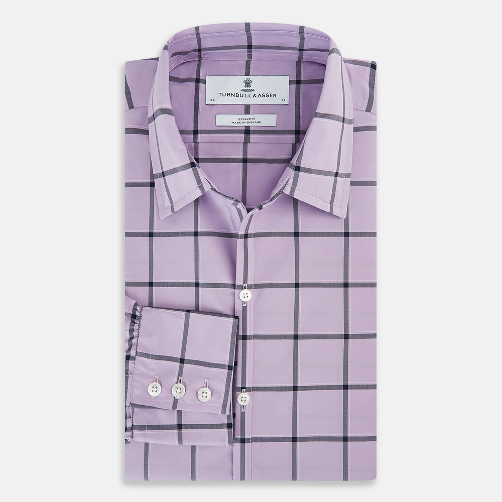 A long-sleeve, button-up Lilac Grid Check Windsor Shirt by Turnbull & Asser, featuring a black windowpane pattern and a refined Windsor collar, displayed on a plain white background.