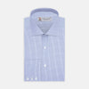 View 1 of product The Turnbull & Asser Blue Grid Check Shirt with Regent Collar and 3-Button Cuffs features white buttons and is neatly folded on a white background.