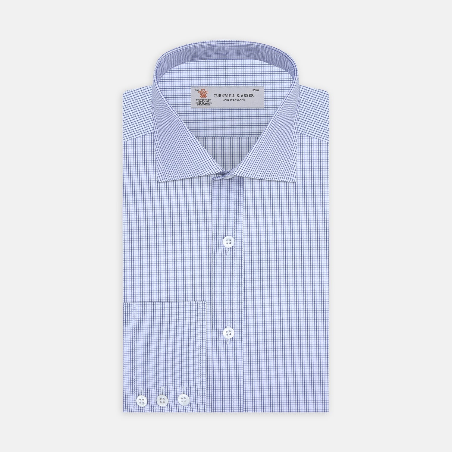 View 1 of product The Turnbull & Asser Blue Grid Check Shirt with Regent Collar and 3-Button Cuffs features white buttons and is neatly folded on a white background.