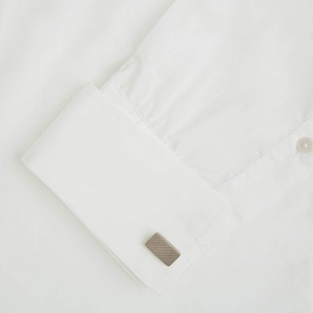 Turnbull & Asser's Silver Diagonal Striped Rectangular Cufflinks feature a sleek sterling silver design with diagonal stripes, displayed against a plain white background.