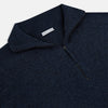 View 2 of product The Turnbull & Asser Navy Melange Half-Zip Cashmere Jumper features long sleeves, a high collar, and a half-zip front, showcased on a plain white background.