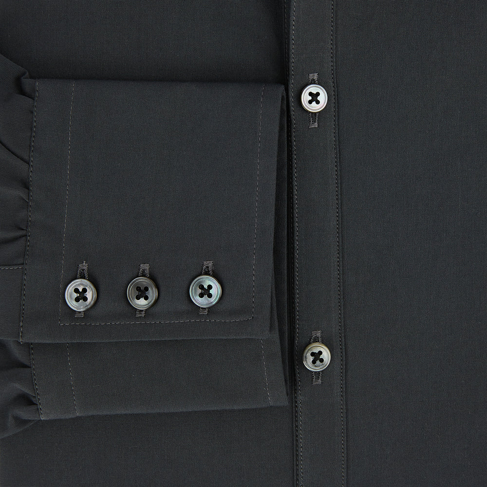 The Charcoal Windsor Shirt by Turnbull & Asser is a black, long-sleeve button-up with a pointed Windsor collar, buttoned cuffs, and a straight hem, shown flat on a white background.